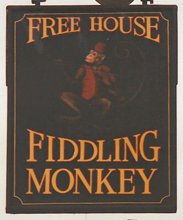 Fiddling Monkey sign 1980s