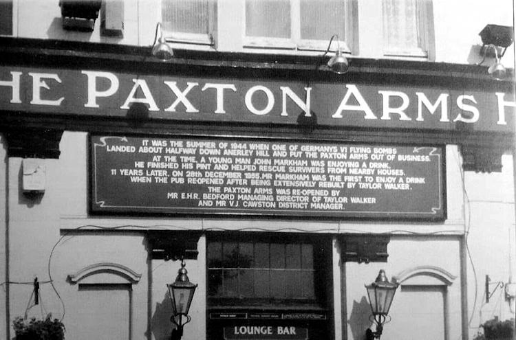 Paxton Arms original ]war damage sign