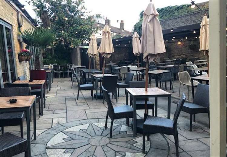 Belle and Lion outside 2025